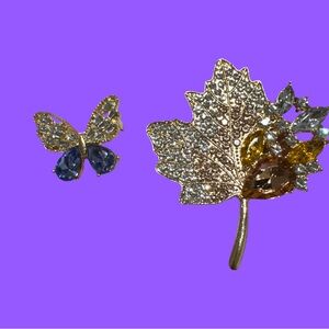 Elegant Gold and Silver Leaf Brooch with Butterfly Accent